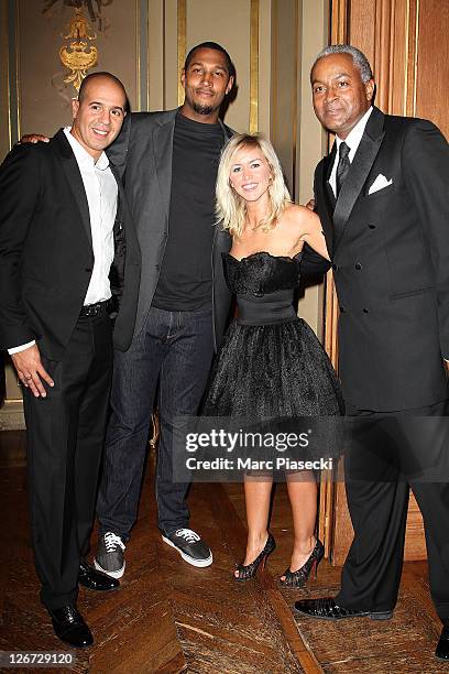 Cut Killer, guest, Enora Malagre and Tony Parker Senior attend the 'ParCoeur Gala' at Mairie de Paris on September 26, 2011 in Paris, France.