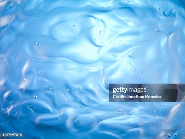 blue jelly pattern - thick liquid texture stock pictures, royalty-free photos & images