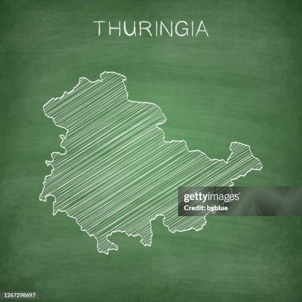 thuringia map drawn on chalkboard - blackboard - school bulletin board stock illustrations