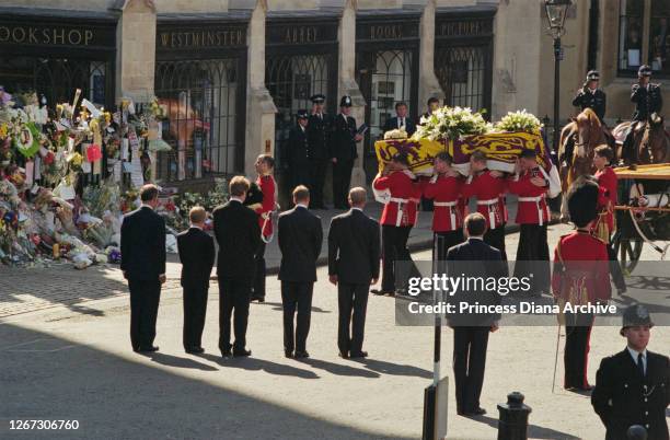 Prince Charles, Prince of Wales, Prince Harry, Charles Spencer, 9th Earl Spencer, Prince William, and Prince Philip, Duke of Edinburgh watch as...