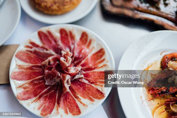 a table full of spanish food - ham stock pictures, royalty-free photos & images