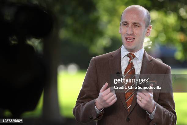White House Senior Policy Advisor Stephen Miller is interviewed on FOX News outside the West Wing of the White House August 20, 2020 in Washington,...
