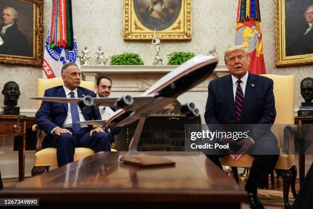 President Donald Trump hosts Iraqi Prime Minister Mustafa Al-Kadhimi in the Oval Office at the White House August 20, 2020 in Washington, DC. One day...