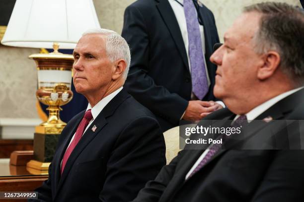 Vice President Mike Pence and Secretary of State Mike Pompeo attend a meeting with President Donald Trump and Iraqi Prime Minister Mustafa Al-Kadhimi...