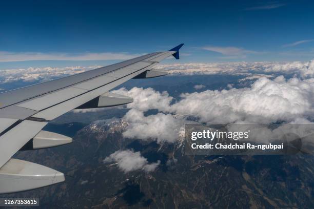 aircraft view airplane travel. fight is flown by jet plane with view of himalai mountain from the plane window. - india nepal stock pictures, royalty-free photos & images