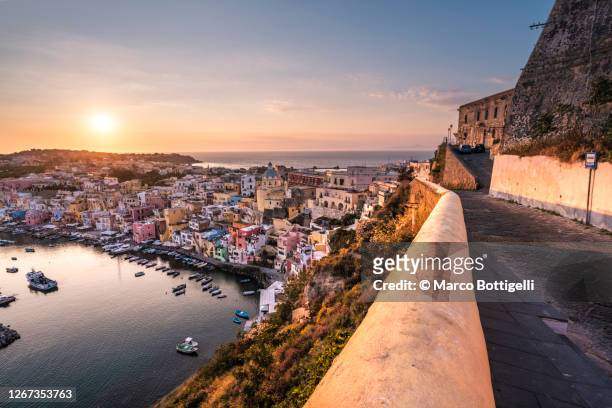 procida at sunset, gulf of naples, italy - naples stock pictures, royalty-free photos & images