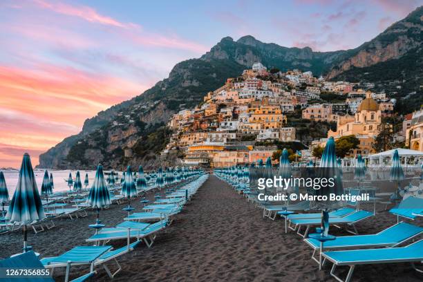 positano at sunset, amalfi coast, italy - positano stockfoto's en -beelden