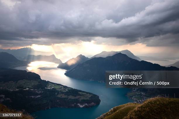 landscape with mountains and sunset glow, ingenbohl, switzerland - lake lucerne stock pictures, royalty-free photos & images