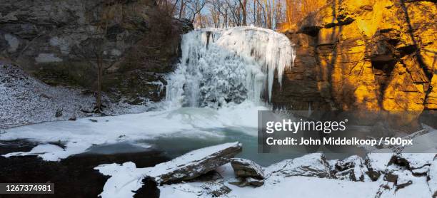 winter landscape of frozen waterfall, columbus, ohio, united states - ohio nature stock pictures, royalty-free photos & images