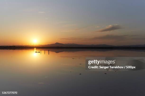 coastline at sunset, larnaca, cyprus - ilha de chipre imagens e fotografias de stock