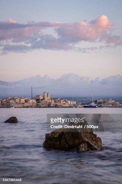 sunrise view of antibes, provence-alpes-cte dazur, france - antibes stock pictures, royalty-free photos & images