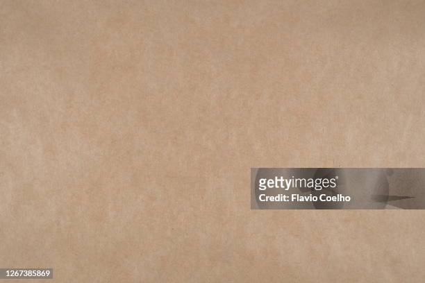 large sheet of brown paper texture background - brunt papper bildbanksfoton och bilder