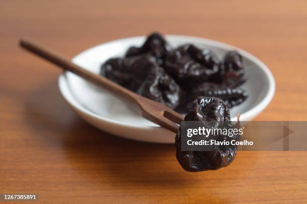 prunes - dried plum stock pictures, royalty-free photos & images