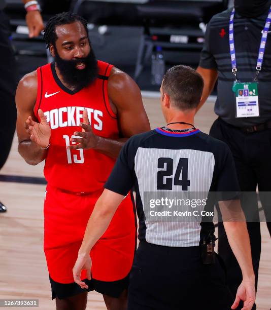 James Harden of the Houston Rockets questions referee Kevin Scott during the second quarter against the Oklahoma City Thunder in Game Two of the...