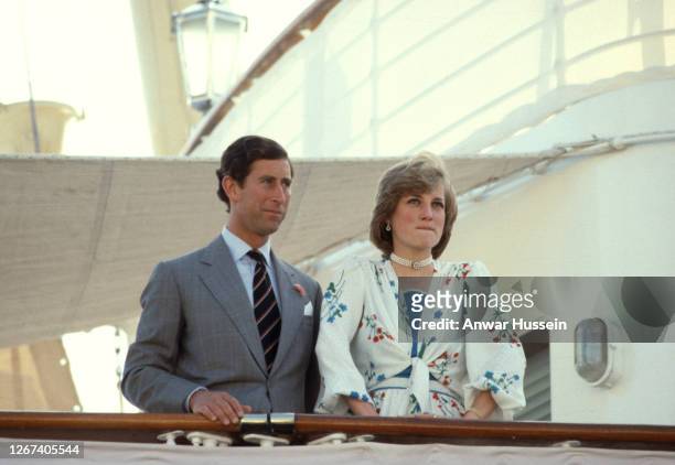 Prince Charles, Prince of Wales and Diana, Princess of Wales, wearing a silk, floral dress designed by Donald Campbell, on board the Royal yacht...