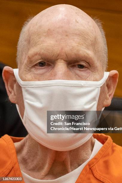 Joseph James DeAngelo looks away from the podium as people who DeAngelo victimized make their statements during the first day of victim impact...