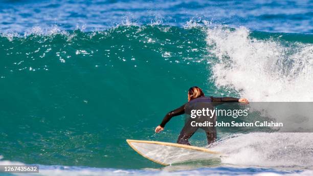 tunisia, surfing in the mediterranean sea - tunisia surfing one person stock pictures, royalty-free photos & images