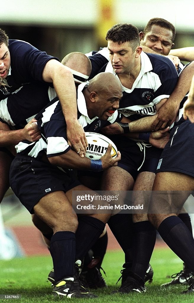 Daryl Thompson Darryl Thompson of Victoria secures the ball during a match against ...