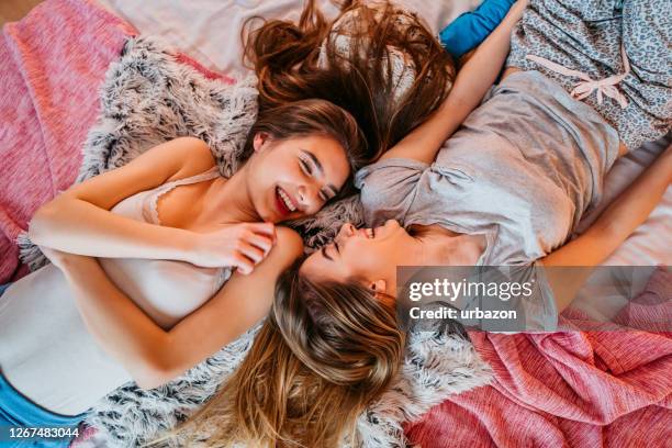 female slumber party - eternal youth stock pictures, royalty-free photos & images