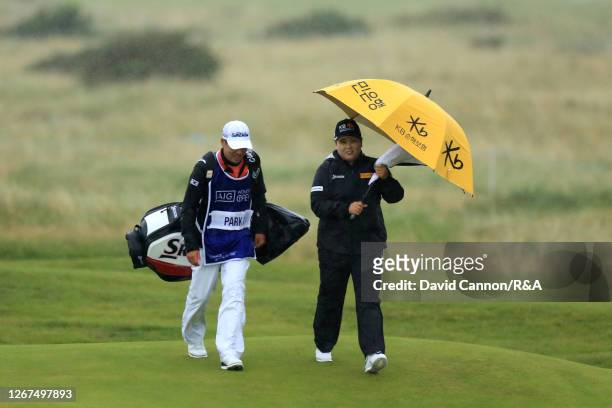 Inbee Park of South Korea makes her way down the 6th alongside caddie Gi Hyeob Nam during Day Two of the AIG Women's Open 2020 at Royal Troon on...