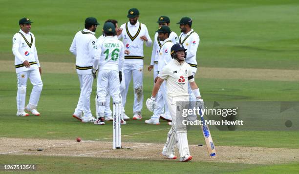 Ollie Pope of England walks off after being dismissed by Yasir Shah of Pakistan during Day One of the 3rd #RaiseTheBat Test Match between England and...