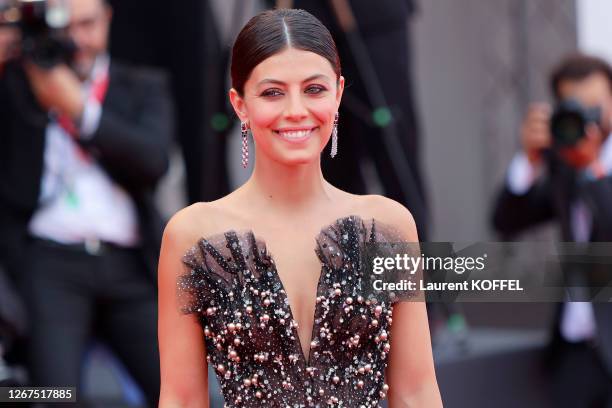 Alessandra Mastronardi walks the red carpet ahead of the Opening Ceremony and the "La Vérité" screening during the 76th Venice Film Festival at Sala...