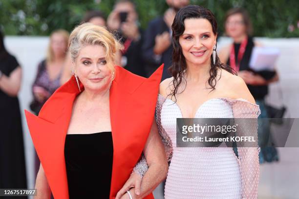Catherine Deneuve and Juliette Binoche walk the red carpet ahead of the Opening Ceremony and the "La Vérité" screening during the 76th Venice Film...