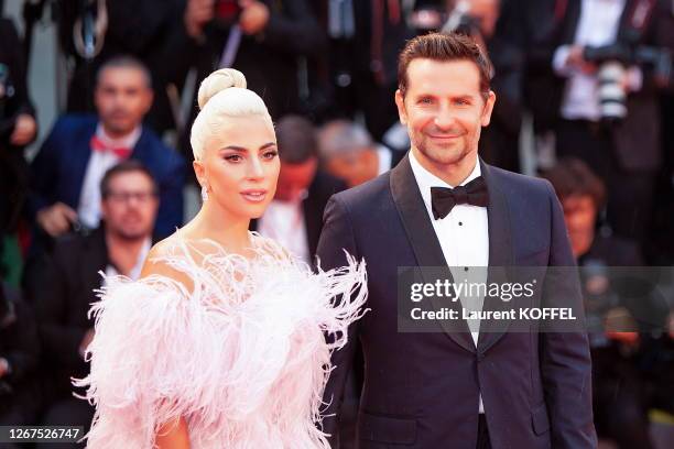 Bradley Cooper and Lady Gaga walk the red carpet ahead of the 'A Star Is Born' screening during the 75th Venice Film Festival at Sala Grande on...