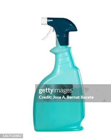 Close-Up of spray bottle with cleaning or disinfectant fluid on a white background Close-Up of spray bottle with cleaning or disinfectant fluid on a white background