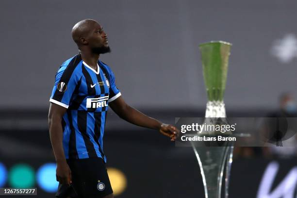 Romelu Lukaku of Inter Milan walks past the UEFA Europa League Trophy prior to the UEFA Europa League Final between Seville and FC Internazionale at...