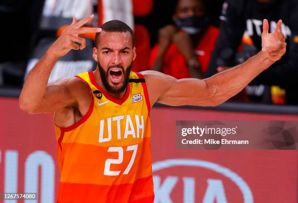 Rudy Gobert of the Utah Jazz celebrates a basket against the Denver Nuggets during the second quarter in Game Three of the Western Conference First...