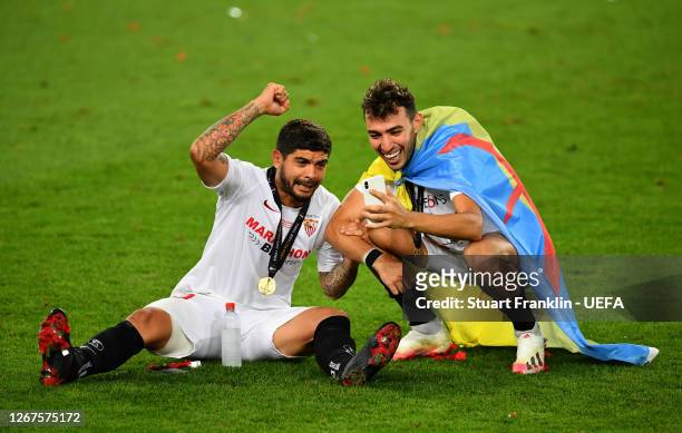 Ever Banega and Munir of Sevilla celebrate following their team's victory in the UEFA Europa League Final between Seville and FC Internazionale at...