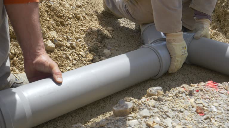 https://media.gettyimages.com/id/1267584679/video/two-plumbers-assemble-grey-pvc-sewage-pipes-during-maintenance-works.jpg?b=1&s=640x640&k=20&c=PL4F73cVFmvwEXrjIlxgTtSObp3GFDTuiocfjPc89Ks=