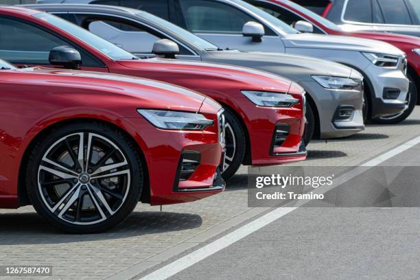 volvobilar på en parkering - parked cars bildbanksfoton och bilder