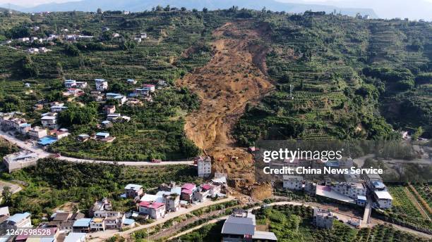 Aerial view of the scene of a landslide at Zhonghai village on August 21, 2020 in Hanyuan County, Sichuan Province of China. A landslide triggered by...