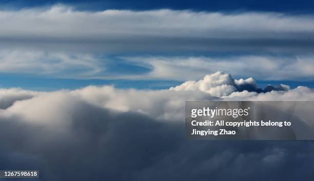 thick clouds in the high altitude sky - thick stock pictures, royalty-free photos & images