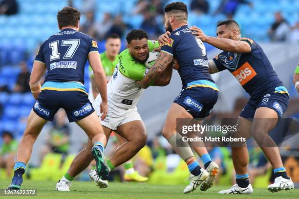 Dunamis Lui of the Raiders is tackled during the round 15 NRL match between the Gold Coast Titans and the Canberra Raiders at Cbus Super Stadium on...