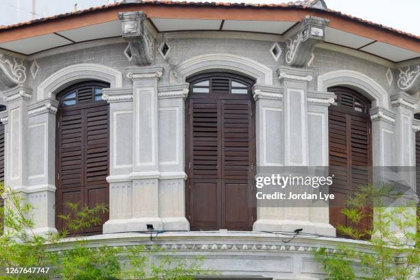 shop house windows of penang - peranakan culture stock pictures, royalty-free photos & images