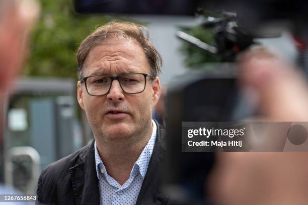 Jaka Bizilj, founder of Cinema For Peace, speaks to the media outside the Charite Hospital where Russian politician Alexei Navalny is being treated,...