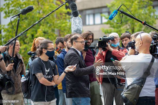 Jaka Bizilj, founder of Cinema For Peace, speaks to the media outside the Charite Hospital on August 22, 2020 in Berlin, Germany. Alexei Navalny has...