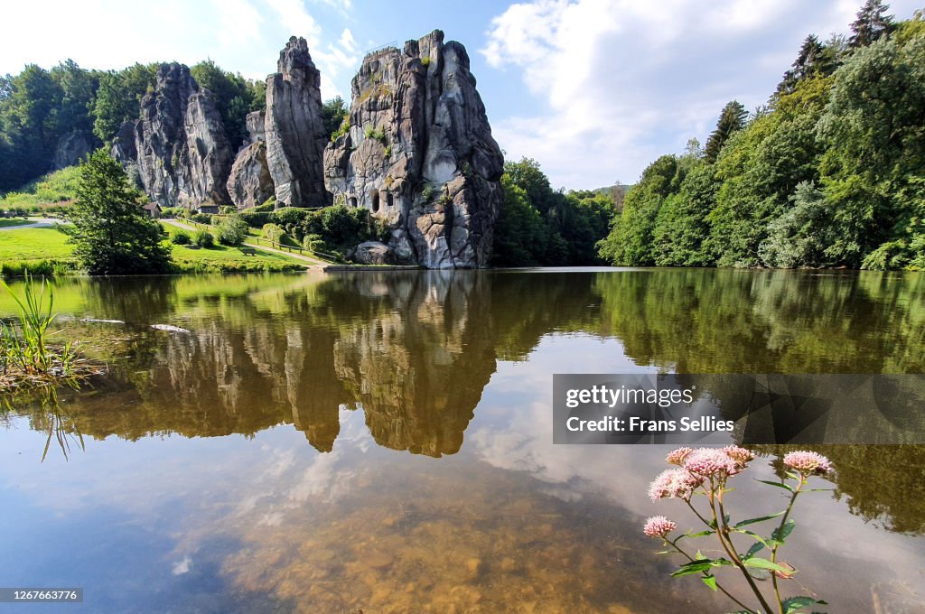 Reflection of Externsteine in the lake, Germany
