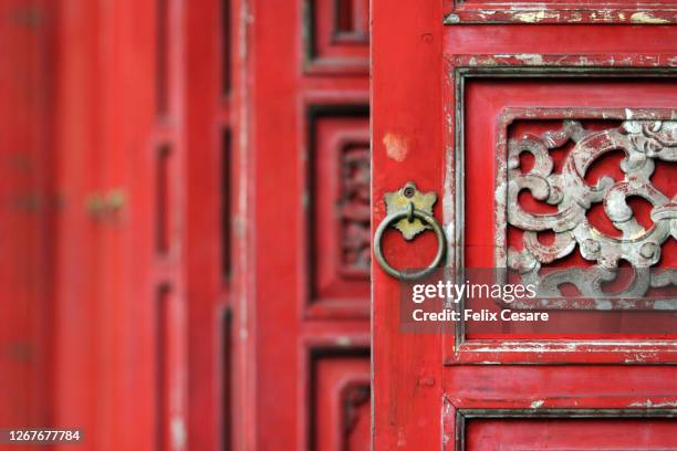 selective focus of a red door - chinese decoration stock pictures, royalty-free photos & images