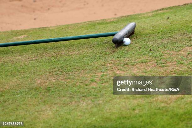 Dani Holmqvist of Sweden ball sits as it got stuck on the bunker rake on the 8th hole during Day Three of the AIG Women's Open 2020 at Royal Troon on...