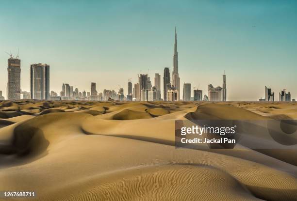 dubai skyline - west asia stock pictures, royalty-free photos & images
