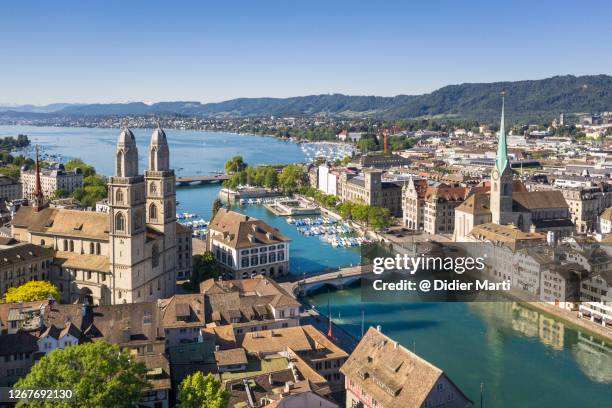 zurich old town by the limmat river on a sunny summer day in switzerland largest city - switzerland stockfoto's en -beelden