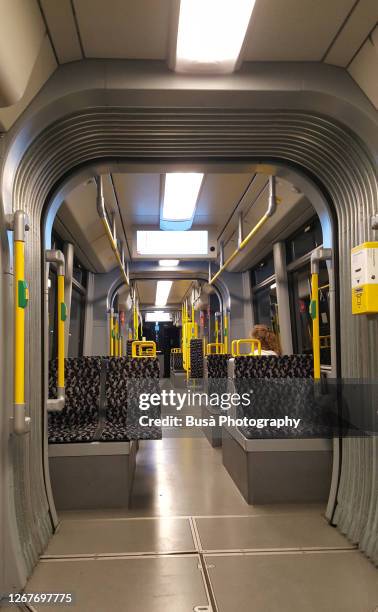 interior of a subway (u-bahn) car in berlin, germany - metro screen door stockfoto's en -beelden