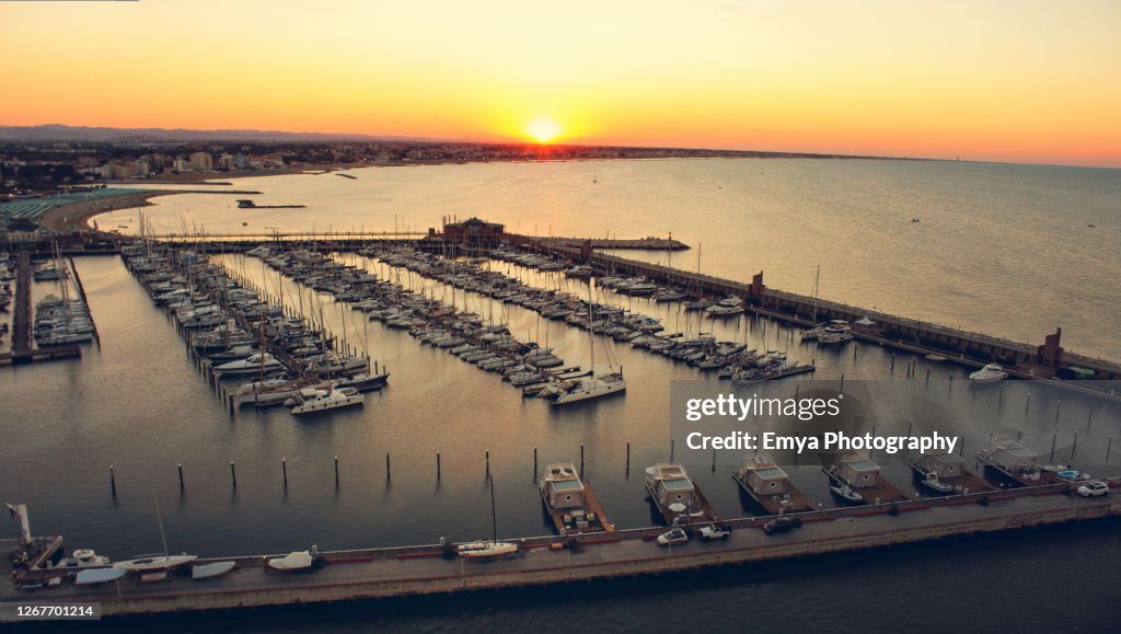 Sunset over the harbor of Rimini, Emilia Romagna, Italy