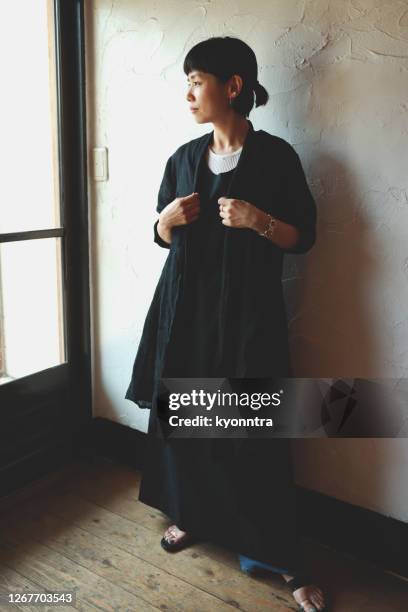 the portrait of woman wearing sustainable fashion - carefree stock pictures, royalty-free photos & images