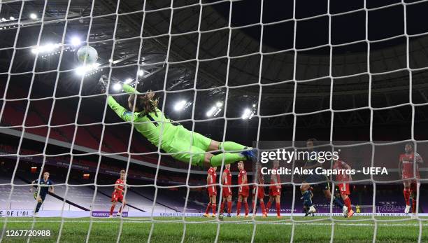 Laura Benkarth of FC Bayern Munich fails to save as Amel Majri of Olympique Lyon scores her team's second goal during the UEFA Women's Champions...