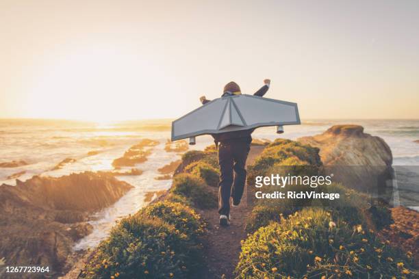 california business boy mit jetpack - zukunft stock-fotos und bilder